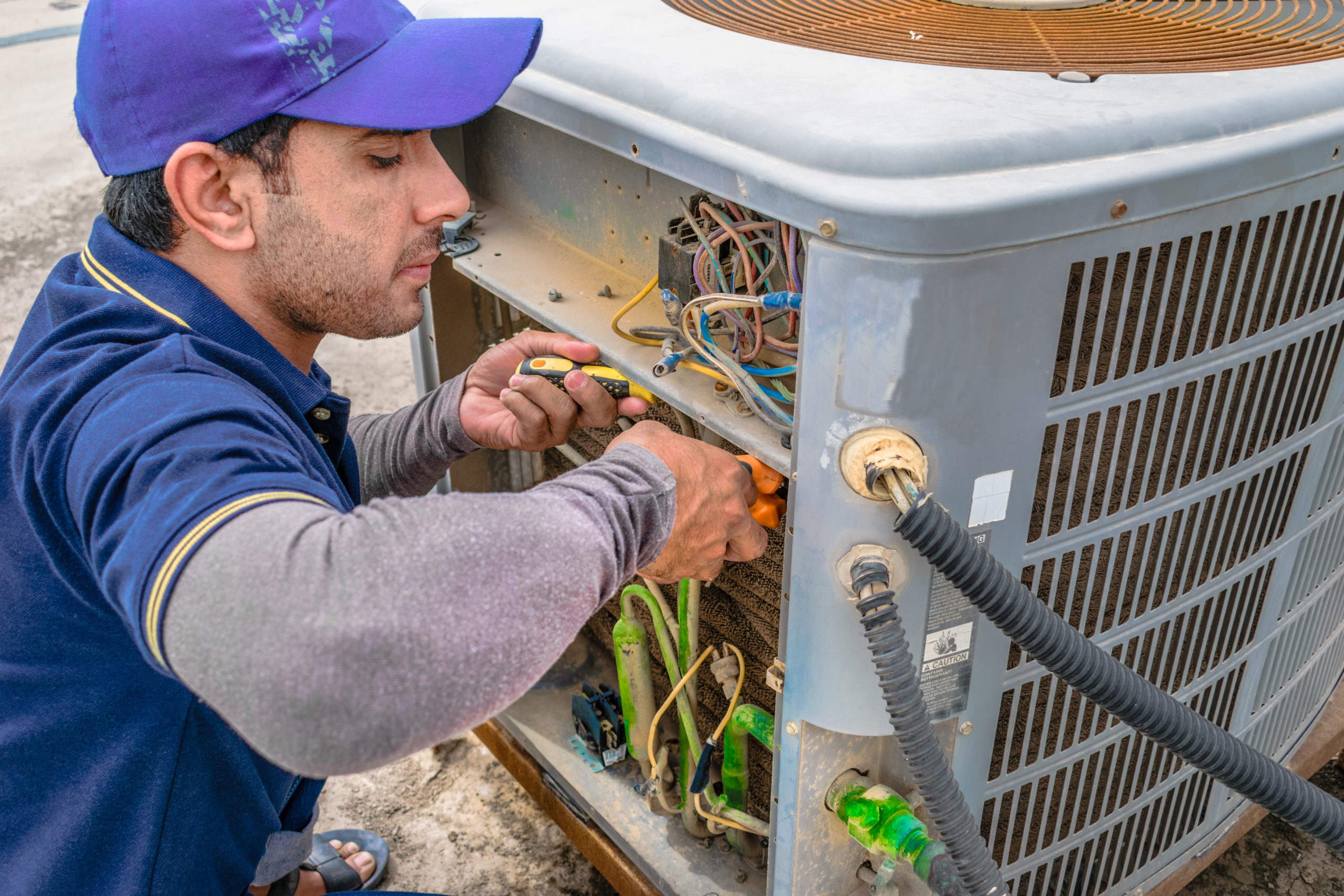 Our expert is repairing AC Unit